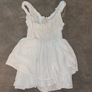 white UO Rosie Smocked Tiered Ruffle Romper size XS barely worn